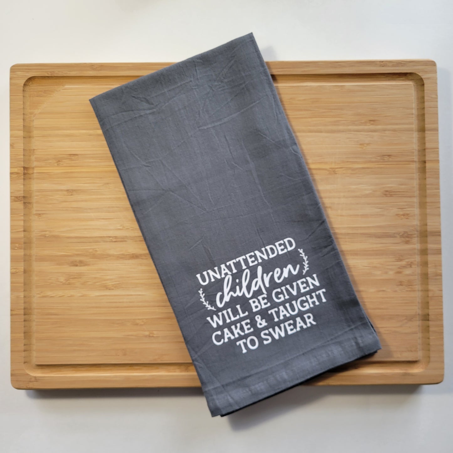 Unattended Children Tea Towel